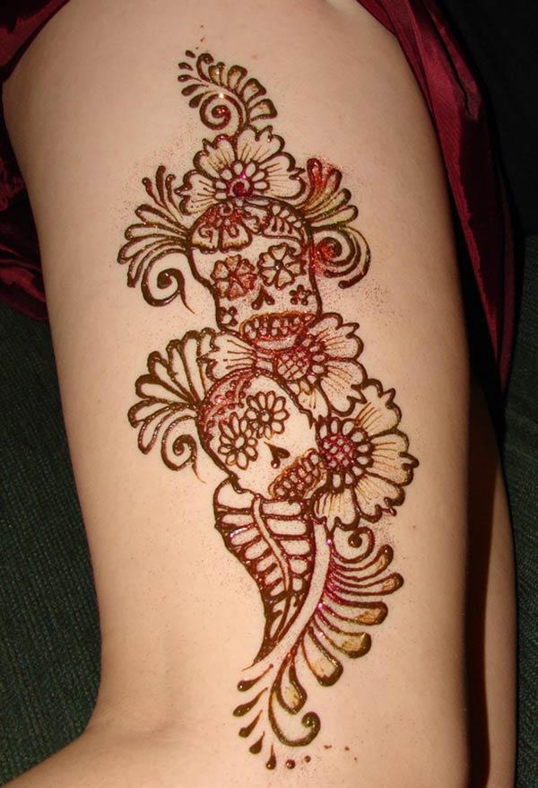 flowers and paisley mehndi design for thighs