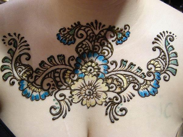 floral Mehendi design on chest 