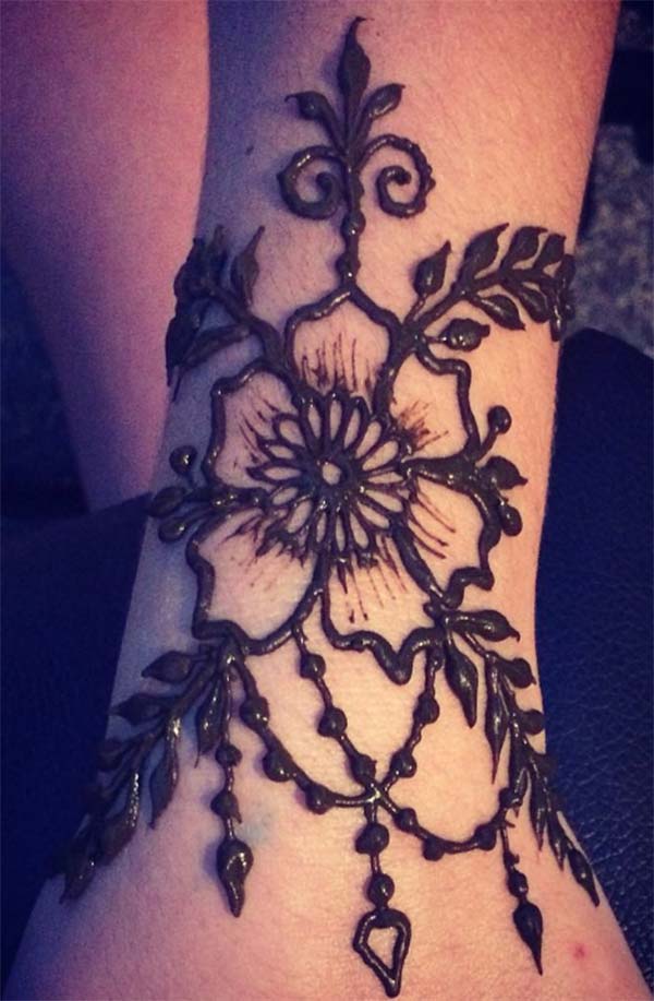 flower and leaves mehndi design for wrist