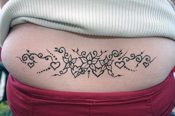 Pretty Floral Mehendi Design on Lower Back