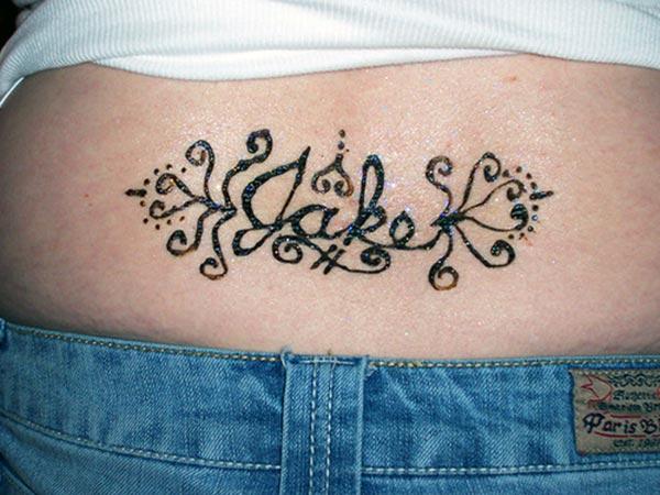 Simple Name Wording Mehndi Design on Lower Back