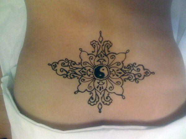 Yin and yang Mehndi Design on Lower Back