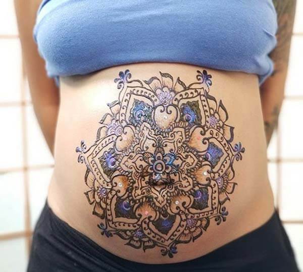 A breathtaking vibrant mehendi design on stomach for Woman