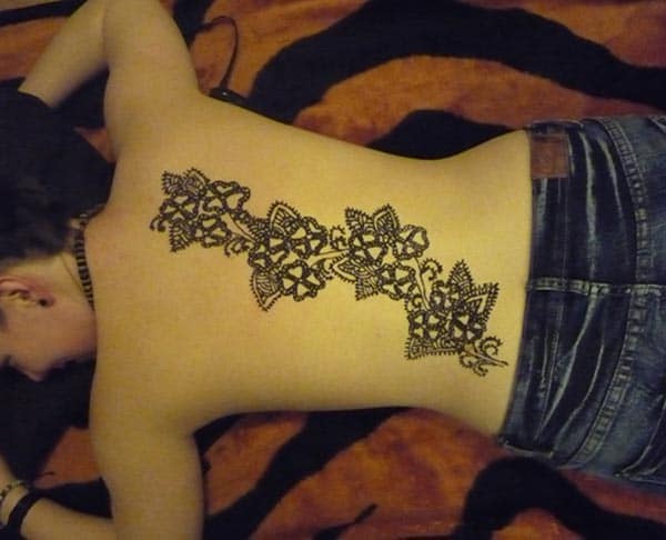 A beautiful back mehendi design for Ladies