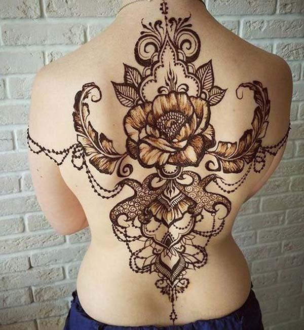A magnificent back mehendi design for girls who love henna tattooing