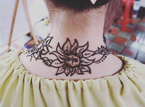 A floral neck cuff mehendi design for Girls