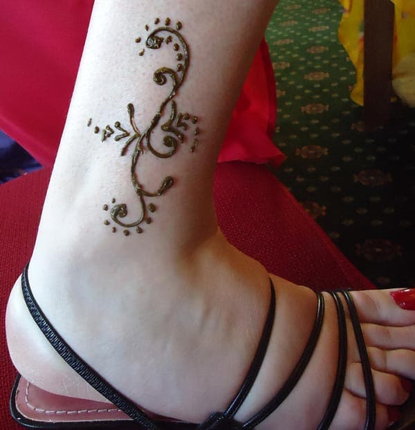 A simple mehendi design on ankle for Girls