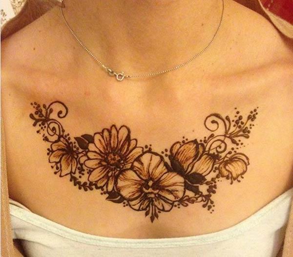 A floral pendant mehndi design on chest for girls and women