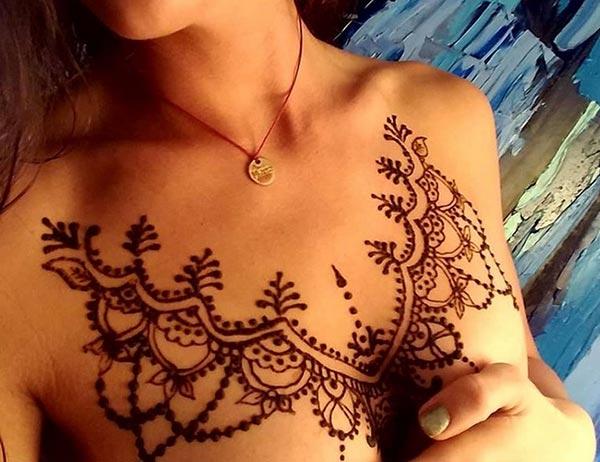 An awesome chest mehendi design for Ladies