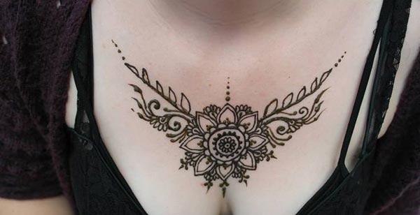 A lovely flower mehendi design on chest for Ladies and women