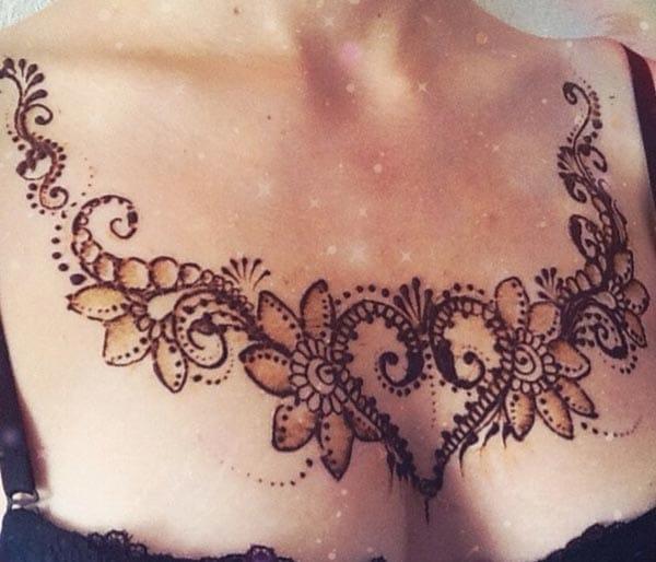 A striking mehndi design on chest for Girls and Ladies
