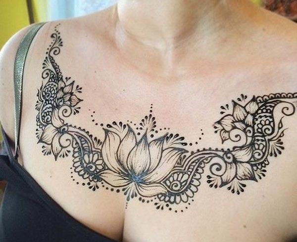 A majestic mehndi design on chest for Women