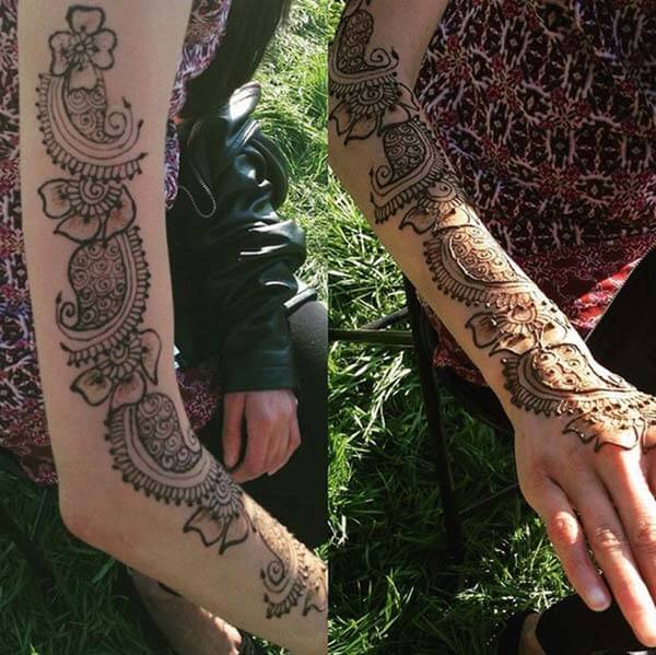 A lovely mehendi design on full arm for Girls