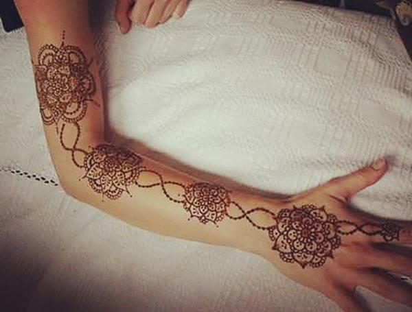 A graceful full hand mehendi design for Ladies and girls