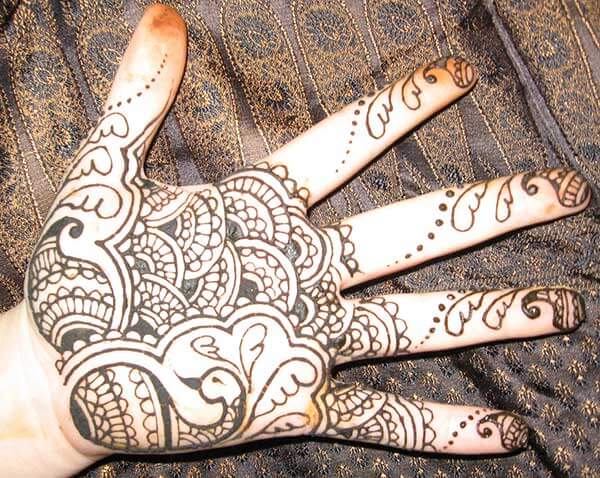 A lovely palm mehendi design for girls